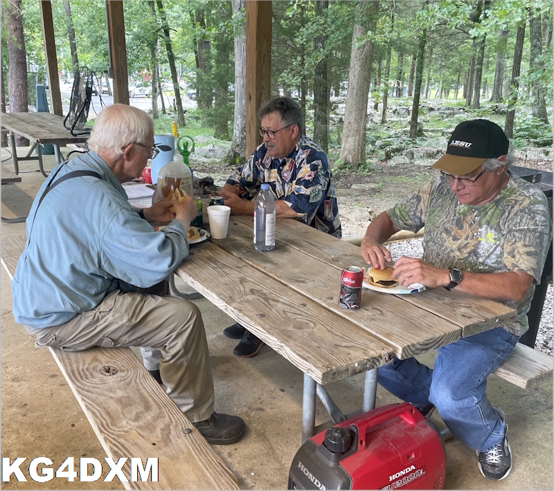 Doc Dave KG4HVQ, Randall W4DEU, and Barry W4NIC partaking of a fine meal. 