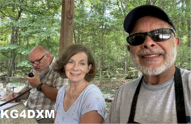 Clara KO4OQB and Billy KG4DXM help Nick KQ4GIO make contacts.