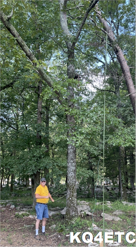 Godfrey KD4ONB erects an antenna.